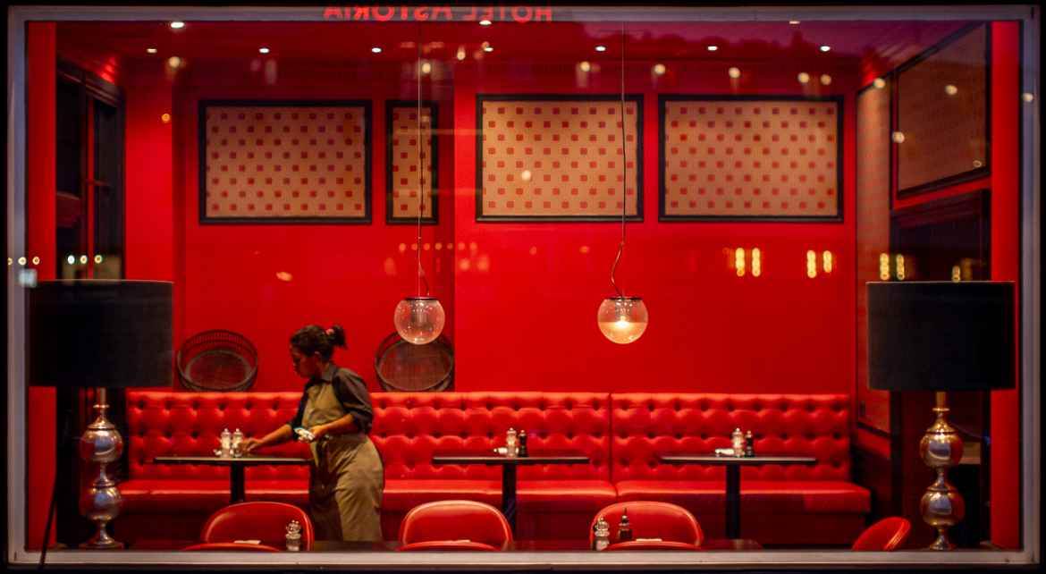 Waiter cleaning tables at the Astoria Copenhagen